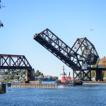 Hiram M Chittenden Locks - Salmon Bay Bridge opening up to let tugboat through - Landmarks & Historical Buildings Near Me - Seattle, Washington Hiram M Chittenden Locks - Salmon Bay Bridge opening up to let tugboat through - Landmarks & Historical Buildings Near Me - Seattle, Washington