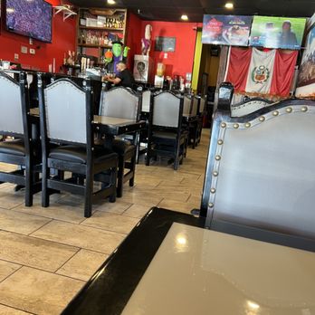Panca - tables and chairs in a restaurant - Peruvian Near Me - Nashville, Tennessee Panca - tables and chairs in a restaurant - Peruvian Near Me - Nashville, Tennessee