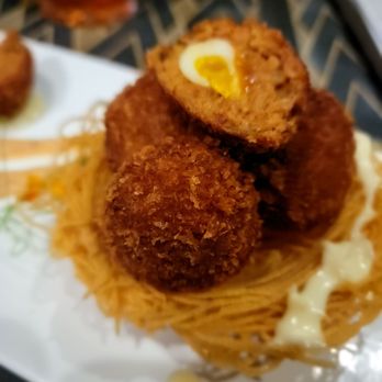 Blind Ox - Scotch quail egg. Made with chirizo. - Tapas/Small Plates Near Me - Honolulu, Hawaii Blind Ox - Scotch quail egg. Made with chirizo. - Tapas/Small Plates Near Me - Honolulu, Hawaii