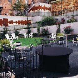 The Glass House - Beautiful Outdoor seating right off of the Bluff Walk