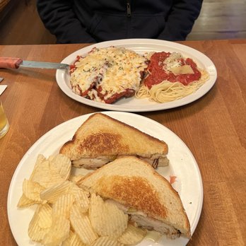 The Garrison Restaurant and Bar - Chicken Parmigiana with angel hair The Kooom sandwich - Bars Near Me - Lake George, New York The Garrison Restaurant and Bar - Chicken Parmigiana with angel hair The Kooom sandwich - Bars Near Me - Lake George, New York
