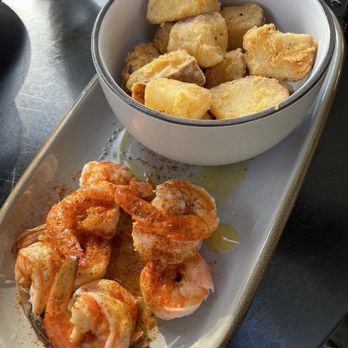 Mr Shucks Seafood - Garlic shrimp w/ battered potatoes - Seafood Near Me - St. Simons Island, Georgia Mr Shucks Seafood - Garlic shrimp w/ battered potatoes - Seafood Near Me - St. Simons Island, Georgia