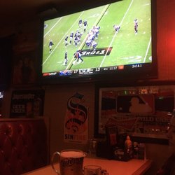 Sullivan Scoreboard - Great place for football and beer. Ambient calm atmosphere and great prices on beer $10/pitcher for domestics. Great staff