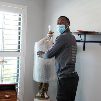 Direct Relocation Services - Dave taking extra special care of my antique Greek goddess floor lamp. My most valuable possesion. - Movers Near Me - Davie, Florida