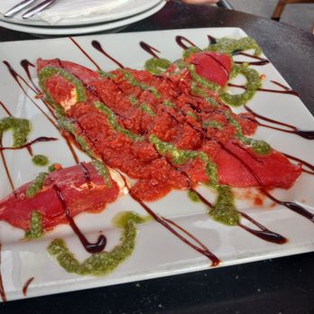 Screaming Banshee Pizza - Piquillo peppers stuffed with cream cheese and pesto on top. - Pizza Near Me - Bisbee, Arizona