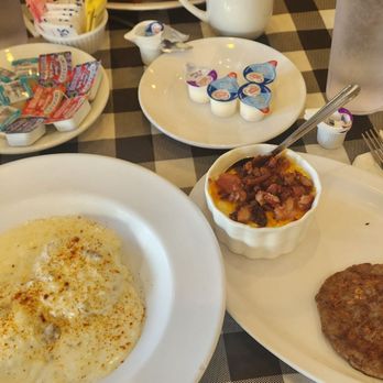 Slices Pizza - Biscuits and Gravy, Bacon Cheesey Grits, and Sausage Patties - Pizza Near Me - Melbourne, Florida Slices Pizza - Biscuits and Gravy, Bacon Cheesey Grits, and Sausage Patties - Pizza Near Me - Melbourne, Florida