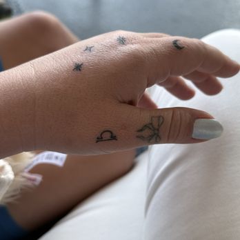 Deep Blue Tattoo - Handholding tattoo: Libra, stars, crescent moon - Tattoo Near Me - Grover Beach, California Deep Blue Tattoo - Handholding tattoo: Libra, stars, crescent moon - Tattoo Near Me - Grover Beach, California