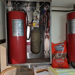 Lighthouse Fire Protection - Replacing pyro-chem bottles every 12 years for fire suppression system