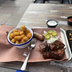 Spitfire - The brisket, the jalapeño cheese, sausage, and tater tots