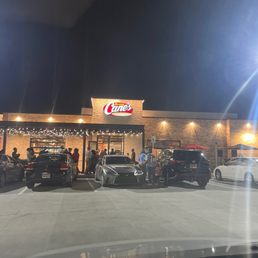 Front entrance on Grand Opening: line out the door with DJ present Front entrance on Grand Opening: line out the door with DJ present