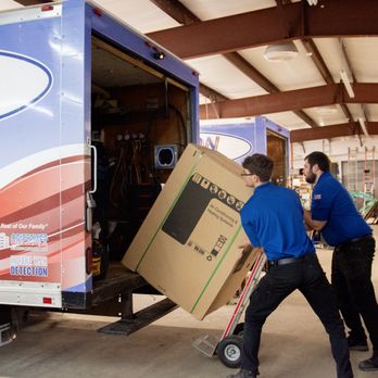 Johnson Heating, Cooling, and Plumbing - Technicians loading truck. - Plumbing Near Me - Franklin, Indiana Johnson Heating, Cooling, and Plumbing - Technicians loading truck. - Plumbing Near Me - Franklin, Indiana