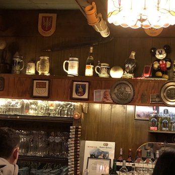 Laschet's Inn - a bar with many items on the wall - German Near Me - Chicago, Illinois
