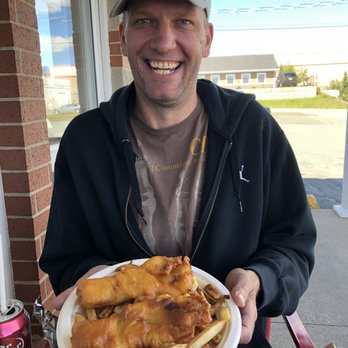Fredie's Fantastic Fish House - Adam enjoying his fish - Fish & Chips Near Me - Halifax, Nova Scotia Fredie's Fantastic Fish House - Adam enjoying his fish - Fish & Chips Near Me - Halifax, Nova Scotia