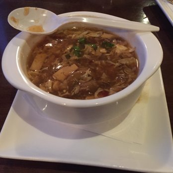 Frenasia - Hot and sour soup served with a plastic spoon. - Asian Fusion Near Me - Howard Beach, New York Frenasia - Hot and sour soup served with a plastic spoon. - Asian Fusion Near Me - Howard Beach, New York