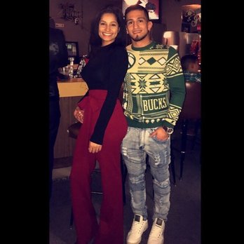 One More - a man and a woman posing for a picture - Sports Bars Near Me - West Allis, Wisconsin One More - a man and a woman posing for a picture - Sports Bars Near Me - West Allis, Wisconsin