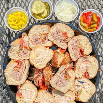 PrimoHoagies - a platter of sandwiches and pickles - Sandwiches Near Me - Raleigh, North Carolina PrimoHoagies - a platter of sandwiches and pickles - Sandwiches Near Me - Raleigh, North Carolina