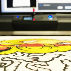 Alchemy Print Shop - Direct to garment on a white tee. Full color resolution using out epson f2100 printer in house.