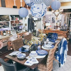 Barbara Stewart Interiors - A fun way to enjoy your dining experience...with paper balloons! Our blue and white table setting is perfect for every day dining.