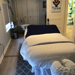 TRISH Massage and Myofascial Release - Treatment room with bathroom close by.