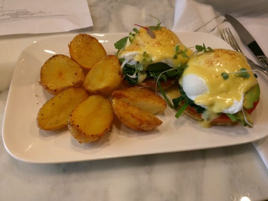 Photo of The Voya Restaurant - Mountain View, CA, US. Crab Benedict with a side of Breakfast Potatoes