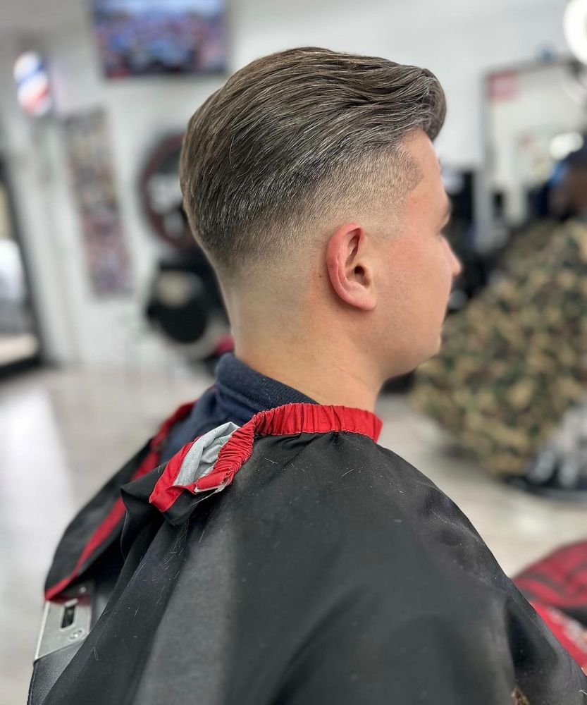 Suave Elite Barbershop Logo
