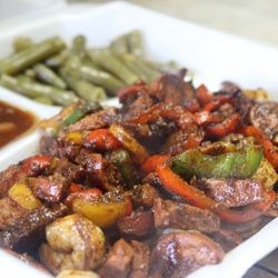 Top's Backyard Restaurant and Grill - Cajun Shrimp and Sausage with 2 sides