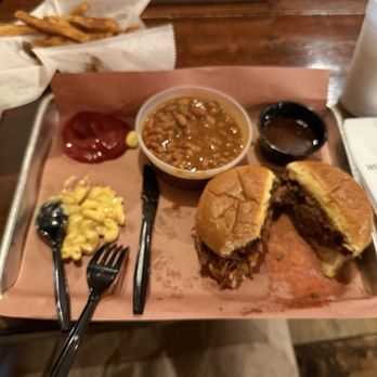 Hutchins BBQ - House Special -- Chopped Barbecue Brisket sandwich with barbecue beans, mac & cheese, french fries & original bbq sauce. - Barbeque Near Me - McKinney, Texas