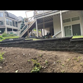 Lupe’s Landscape - After; Lupes Landscape built the retaining wall and removed the wooden edge. - Landscaping Near Me Lupe’s Landscape - After; Lupes Landscape built the retaining wall and removed the wooden edge. - Landscaping Near Me