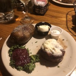 Bynum's Steakhouse - 7oz filet with garlic butter, baked potato
