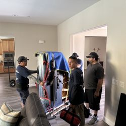 Angelos Moving Services - Had enough men to safely move and carefully lay down the piano.
