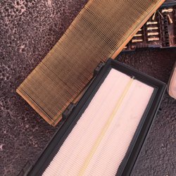 University Car Care - New air filter vs old air filter. According to a reputable mechanic, it hasn't been changed ever - yellow is original