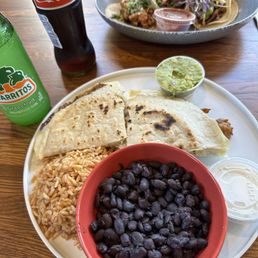 Foreground - El Pastor quesadillas (pork), rear- 3 taco special selecting different proteins.