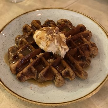 Two Hands - sticky date waffle: chantilly cream, maple caramel sauce & crushed almonds! Yay! It's gluten free - Breakfast & Brunch Near Me - New York, New York Two Hands - sticky date waffle: chantilly cream, maple caramel sauce & crushed almonds! Yay! It's gluten free - Breakfast & Brunch Near Me - New York, New York