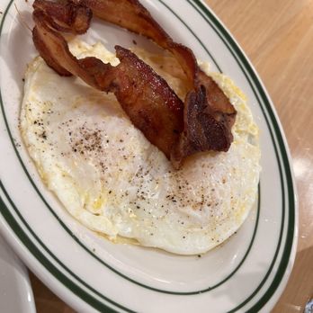 Madi - The side of eggs and Bacon that comes with my Brioche French Toast! So yummy!!! - Breakfast & Brunch Near Me - San Diego, California Madi - The side of eggs and Bacon that comes with my Brioche French Toast! So yummy!!! - Breakfast & Brunch Near Me - San Diego, California