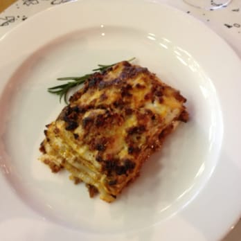 Due Amici - Tiny portion of lasagne. Had to buy snacks for the flight :( - Italian Near Me - Jamaica, New York