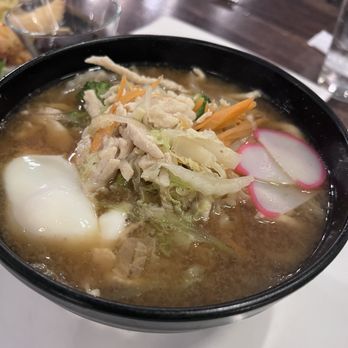 Mr Sushi & Grill - Nebeyaki Udon soup with a floating egg. Chicken broth and chicken slices with vegetales and udon thick noodles. - Japanese Near Me - Middletown, New York Mr Sushi & Grill - Nebeyaki Udon soup with a floating egg. Chicken broth and chicken slices with vegetales and udon thick noodles. - Japanese Near Me - Middletown, New York