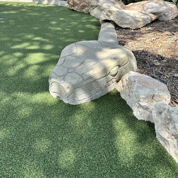 The Putting Mill - Concrete snake circling the green! - Mini Golf Near Me - Spring Branch, Texas The Putting Mill - Concrete snake circling the green! - Mini Golf Near Me - Spring Branch, Texas