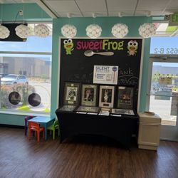 sweetFrog Premium Frozen Yogurt - Sports plaques of famous athletes singe for a chance to win