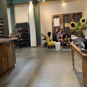 Elevation Ten Winery - a group of people in a tasting room - Wineries Near Me - Clarksburg, California
