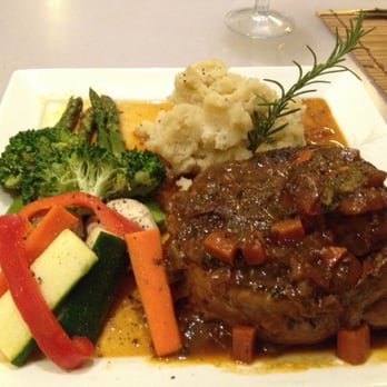 Cafe Julia - Osso Buco.  So soft and fall off the bone.  The marrow inside the bone is to die for.  I could eat just that. - Cafes Near Me - Honolulu, Hawaii