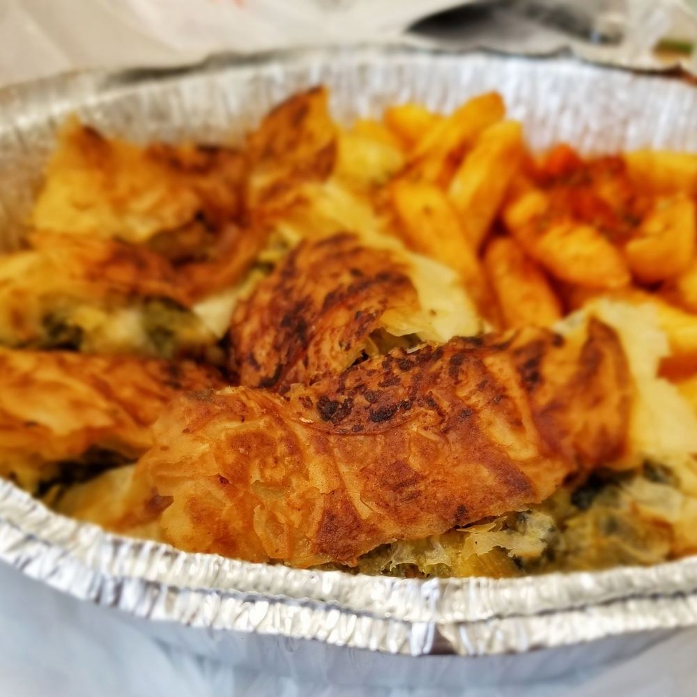 Sparta Taverna - a foil container of food - Greek Near Me - Ridgefield Park, New Jersey