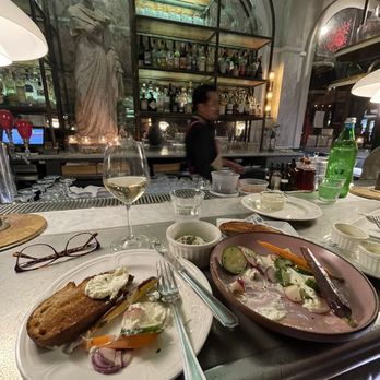 Justine - Goat cheese appetizer, deviled eggs, white wine. - French Near Me - New Orleans, Louisiana Justine - Goat cheese appetizer, deviled eggs, white wine. - French Near Me - New Orleans, Louisiana
