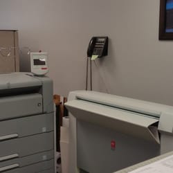 Minuteman Press - Kirkwood - Our Oce large format printers