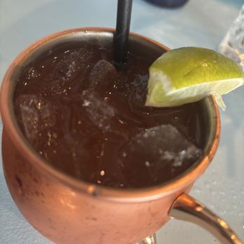 Blu Kouzina - Figenza fig vodka Moscow mule with Jamaican DG's ginger beer - requested blood orange juice in it - Greek Near Me - Sarasota, Florida Blu Kouzina - Figenza fig vodka Moscow mule with Jamaican DG's ginger beer - requested blood orange juice in it - Greek Near Me - Sarasota, Florida