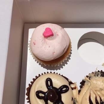 Georgetown Cupcake - Strawberry (top), mocha (bottom left), and a severely melted chocolate peanut butter (right) - Cupcakes Near Me - Washington, DC, District of Columbia Georgetown Cupcake - Strawberry (top), mocha (bottom left), and a severely melted chocolate peanut butter (right) - Cupcakes Near Me - Washington, DC, District of Columbia