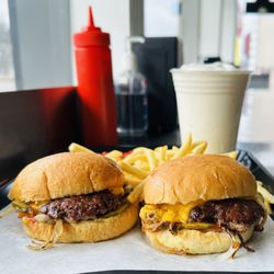 Motz's Burgers - Motz's fresh beef cheeseburger sliders, shoestring french fries and vanilla milkshake.