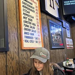 Dave's Bar & Grill - Drew gave her a hat! And that Huckleberry Lemonade...soooo good!