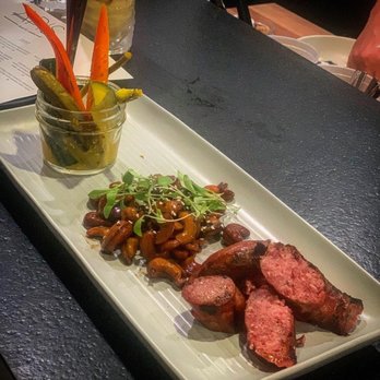 Apis Restaurant - Pickles, Sausage, and (cooked) nuts - Venues & Event Spaces Near Me - Kenosha, Wisconsin