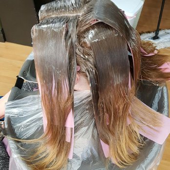 Picasso Salon and Barber - Doing the thermal straightening - Hair Stylists Near Me - Tacoma, Washington