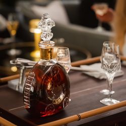 The Curtain Club - Louis XIII with its luxurious carafe made of Baccarat crystal promises pure luxury.